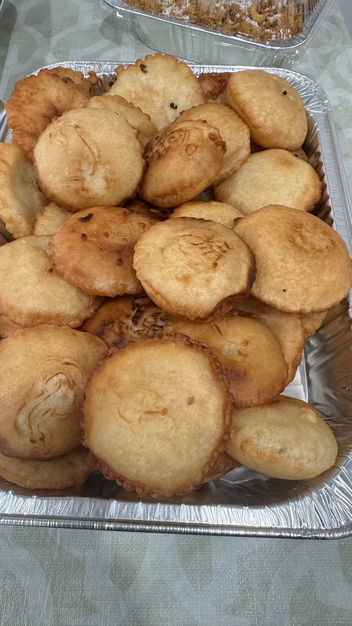Teler Pitha — crispy golden fried rice cakes